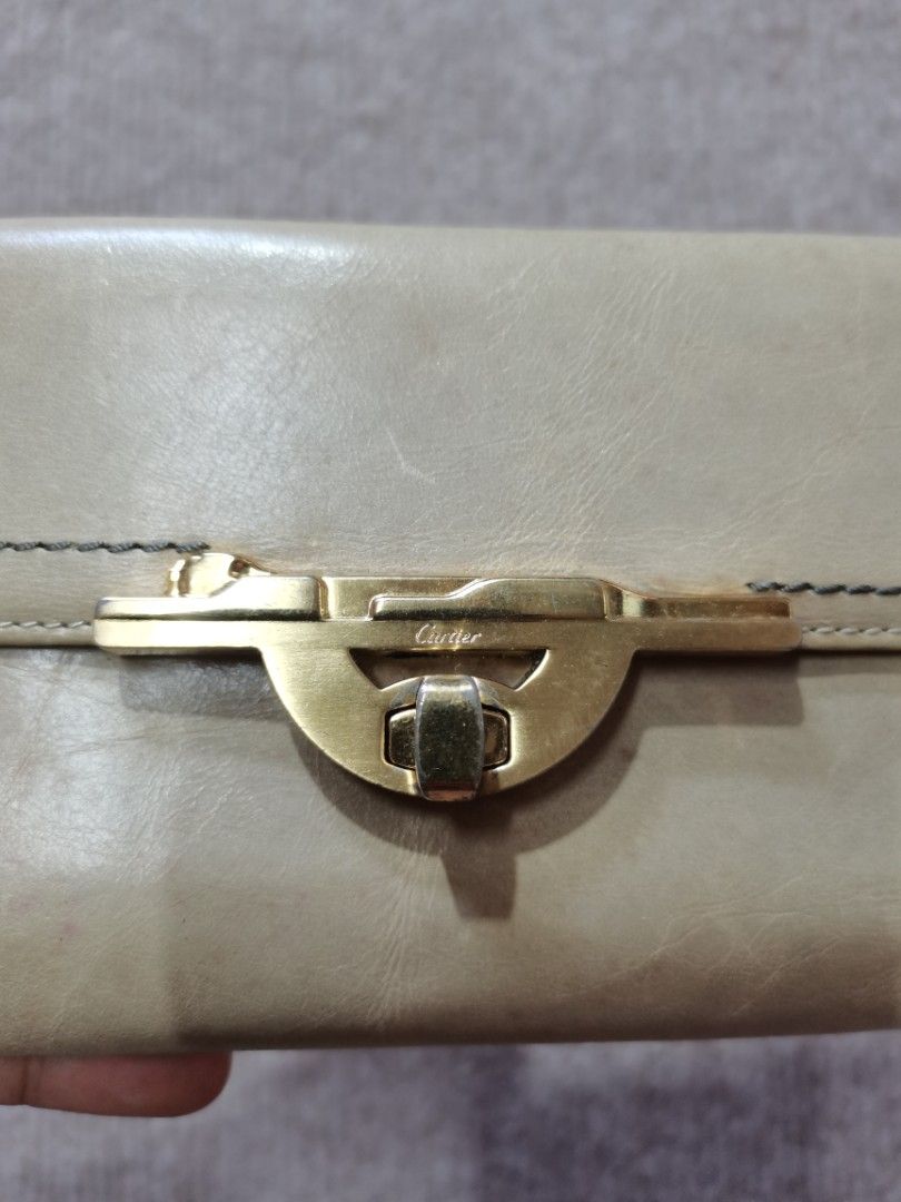 Cartier tri fold wallet (Category: Wallets & Card holders) located in Apalit. Submitted by _doer (Listing ID 1439852949, Image 3). Description: Sign of usage.