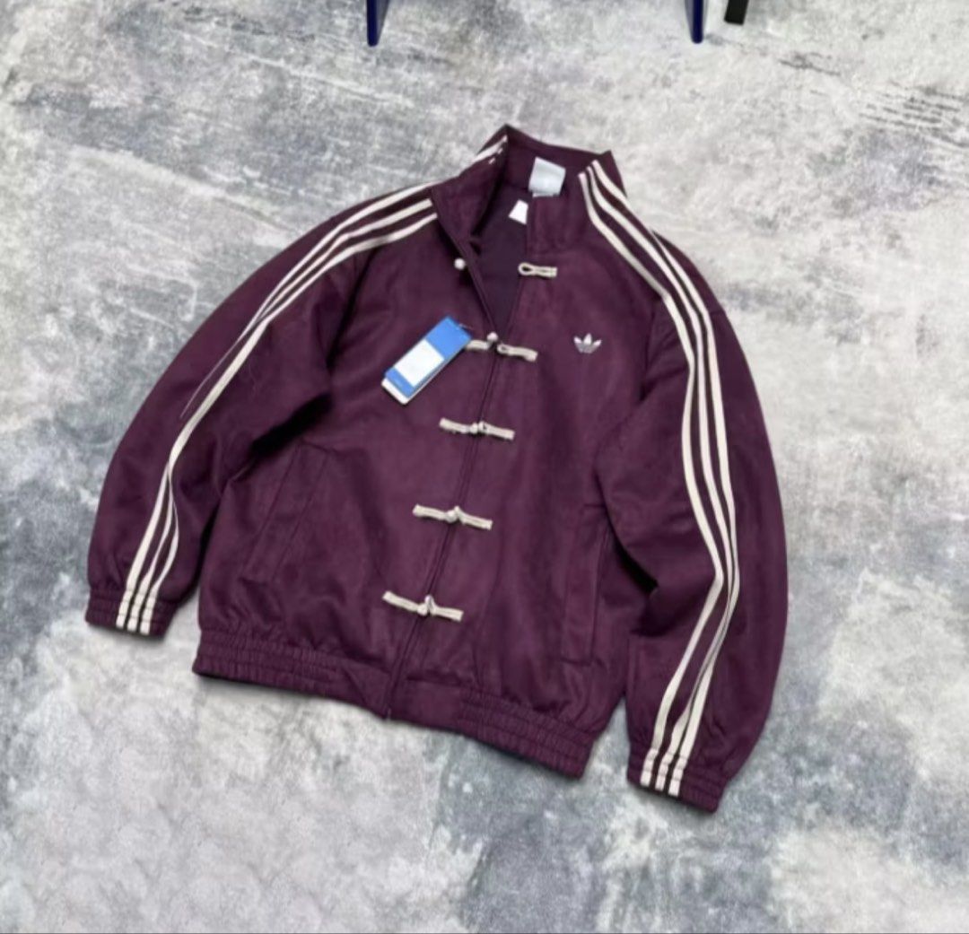 Chinese New Year Adidas Track Jacket (Category: Coats, Jackets and Outerwear) located in Pasay City. Submitted by desharoww (Listing ID 1439964117, Image 3). Description: (REPOSTED LISTING) Viral Premium one-to-one quality Chinese New Year jacket (Adidas-inspired) — straight from China 🇨🇳 Clean stitching, premium suede-like finish, high-grade materials, and perfect fit. Detailed embroidery and quality cuffs just like OG. ✨ NEW COLORS ADDED ✨ No