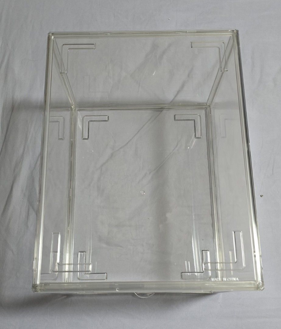 Clear Stackable Display Case (Category: Storage Boxes & Baskets) located in Singapore. Submitted by xtrao (Listing ID 1439914692, Image 2). Description: - Clear, stackable display boxes for easy viewing. - Perfect for showcasing your prized collection. - Protect your favorite from dust and damage. - Convenient front-opening door for easy access. - Dimensions: 36cm (L) x 27cm (W) x 20cm (H)..