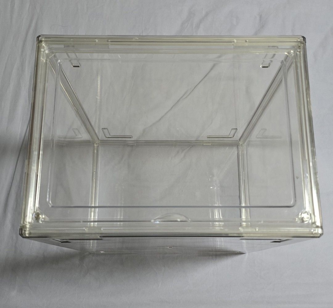 Clear Stackable Display Case (Category: Storage Boxes & Baskets) located in Singapore. Submitted by xtrao (Listing ID 1439914692, Image 3). Description: - Clear, stackable display boxes for easy viewing. - Perfect for showcasing your prized collection. - Protect your favorite from dust and damage. - Convenient front-opening door for easy access. - Dimensions: 36cm (L) x 27cm (W) x 20cm (H)..