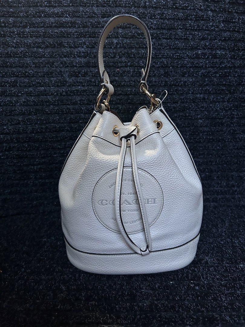 Coach Dempsey Drawstring Bucket Bag (Category: Luxury Bags & Wallets) located in Pasig City. Submitted by califinestcollectibles (Listing ID 1439909738, Image 1). Description: Length : 28cm Width : 14cm Height: 25cm Original/Authentic Actual and Detailed Pictures are Posted Pick Up at One Oasis condominium ortigas extension pasig city Or Delivery via Lalamove,Jnt, LBC cod/cop JNT (payment first basis,gcash) THANKYOU!.