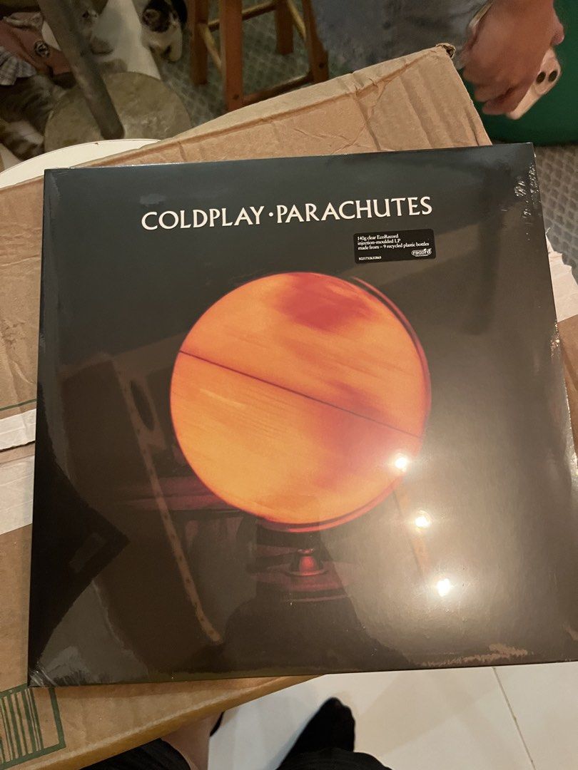 Coldplay Parachutes Vinyl Record (Category: Vinyls) located in Cavite. Submitted by live_bearomulo (Listing ID 1439987690, Image 1). Description: - Brand New & Sealed Coldplay 'Parachutes' Vinyl Record - 180g Clear EcoRecord Edition - Made from 9 Recycled Plastic Bottles - A Must-Have for Coldplay Fans.