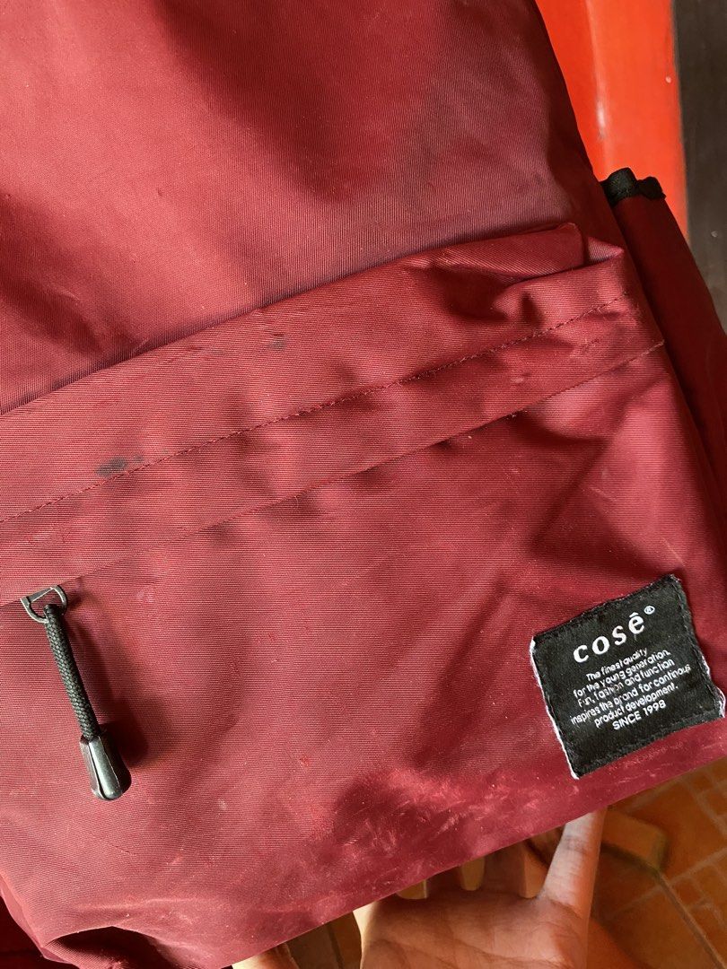 COSĒ red waterproof big backpack unisex school bag (Category: Backpacks) located in Imus. Submitted by fyema (Listing ID 1439844119, Image 2). Description: condition on pics imus cavite loc gcash jnt lalamove.