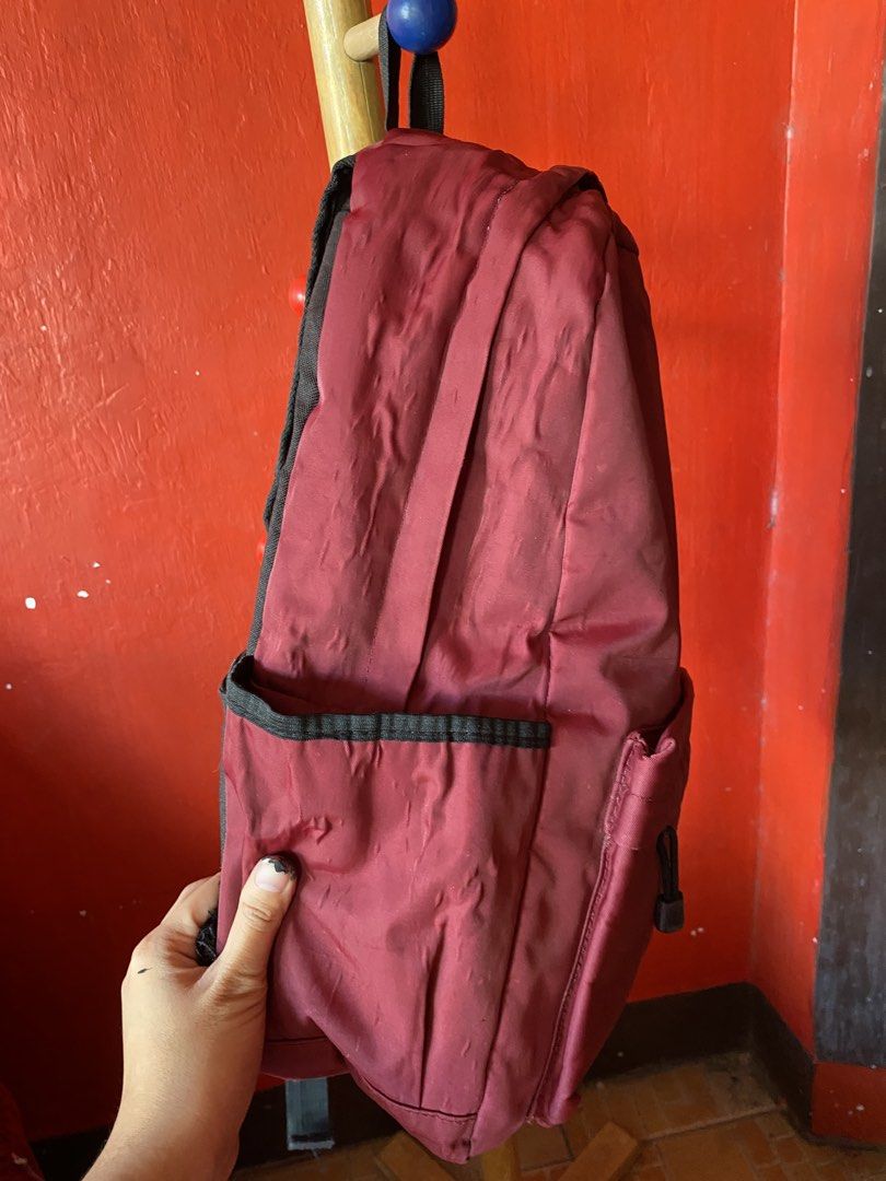 COSĒ red waterproof big backpack unisex school bag (Category: Backpacks) located in Imus. Submitted by fyema (Listing ID 1439844119, Image 3). Description: condition on pics imus cavite loc gcash jnt lalamove.