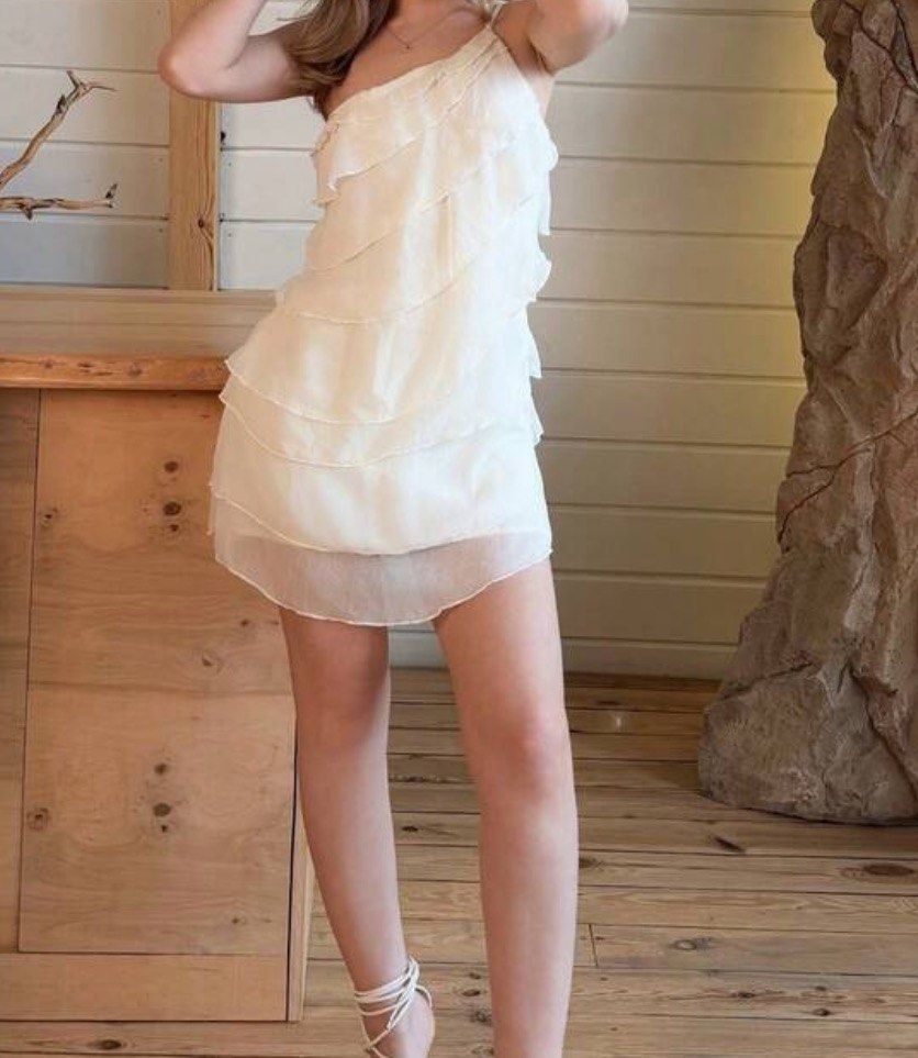 Cream Ruffled Dress (Category: Evening dresses & gowns) located in Quezon City. Submitted by alex_declutter (Listing ID 1439864219, Image 1). Description: XS-S Worn Once.