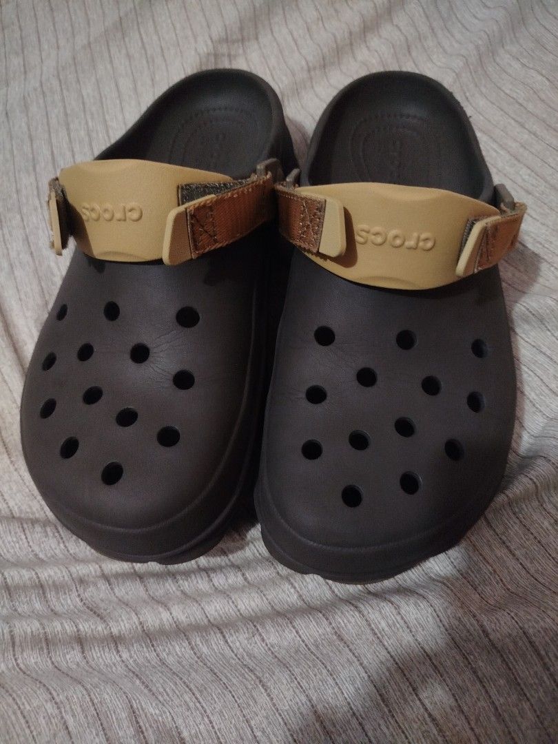 Crocs All terrain Clogs (Category: Slippers & Slides) located in Roxas City. Submitted by yanskiezco (Listing ID 1439989175, Image 1). Description: Crocs Classic All-Terrain Clogs -Color: Dark Brown with Tan Strap -Size: M8/W10 -Authentic -Minimal wear on soles.