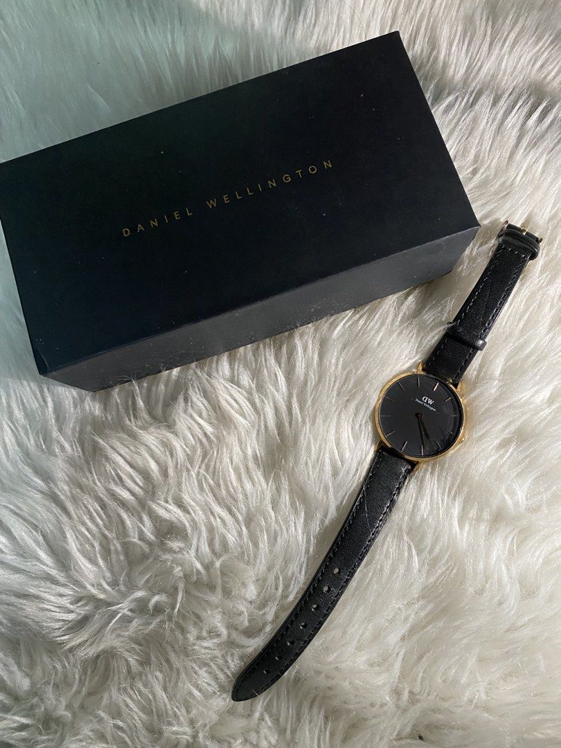 Daniel Wellington Watch Gold Black Leather Strap (Category: Women's Watches) located in Quezon City. Submitted by nicanicks (Listing ID 1439903061, Image 1). Description: - Classic Daniel Wellington watch - Elegant black dial with gold-tone casing - Water resistant up to 3 ATM - Comes with original Daniel Wellington box -Strap was already replaced -New battery .