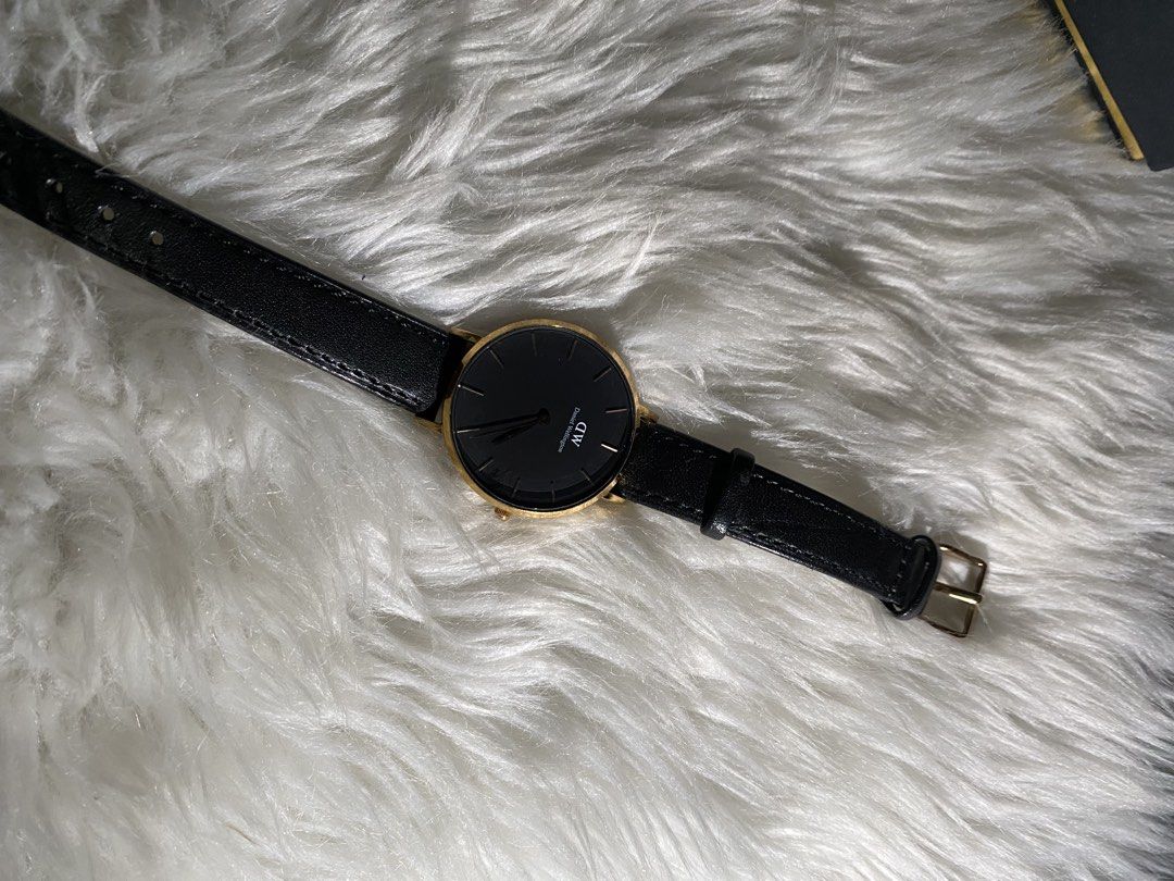 Daniel Wellington Watch Gold Black Leather Strap (Category: Women's Watches) located in Quezon City. Submitted by nicanicks (Listing ID 1439903061, Image 2). Description: - Classic Daniel Wellington watch - Elegant black dial with gold-tone casing - Water resistant up to 3 ATM - Comes with original Daniel Wellington box -Strap was already replaced -New battery .