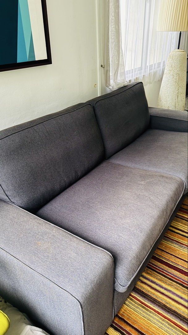Dark Grey 3-Seater Sofa (Category: Sofas) located in Singapore. Submitted by mspractical (Listing ID 1439903355, Image 2). Description: - Comfortable and stylish dark grey 2-seater sofa - Perfect for any living room or extra seating - Ready for a new home - still firm and high density - removable covers .