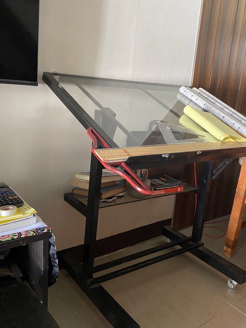 Drafting Table (Category: Office Furniture & Fixtures) located in Manila. Submitted by clexanebea (Listing ID 1439814733, Image 1). Description: fs drafting table for 4500 selling my 24” x 36” drafting table with minimal dents (sa gilid lang promise) bought this for 7500 selling for 4500 may freebies na max fajardo planning and design book and surveying inclusions: led light with cord and plug wheel w stopper mini glass table organizer PM PM PM.