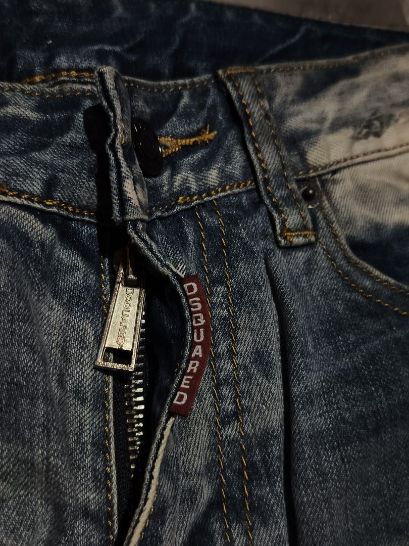 DSQUARED2 "Top Craftsmanship" Distressed Denim Jeans Size 28 (Category: Jeans) located in Talisay. Submitted by rubiobryle20102 (Listing ID 1439899022, Image 3). Description: - Authentic DSQUARED2 denim jeans - Made in Italy - Distressed wash with ripped details - Classic five-pocket styling - Zip fly - Perfect for stylish casual outfits - Excellent Condition (Need wash only) 999 free shipping 🫶.