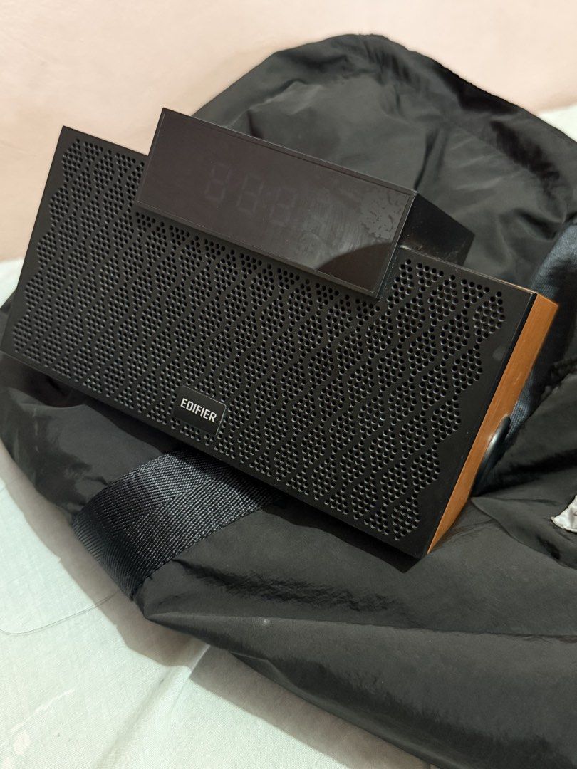 EDIFIER MP260 PORTABLE BLUETOOTH SPEAKER (Category: Soundbars, Speakers & Amplifiers) located in Taguig. Submitted by winbantigs (Listing ID 1439899813, Image 2). Description: The Edifier MP260 is a multifunctional 2.1-channel Bluetooth speaker that doubles as a bedside alarm clock. Priced around 2,400 to 3,500 PHP, it features a premium wooden enclosure, a 20W total output (two 4W tweeters and a 12W subwoofer), an LED display, and versatile conn