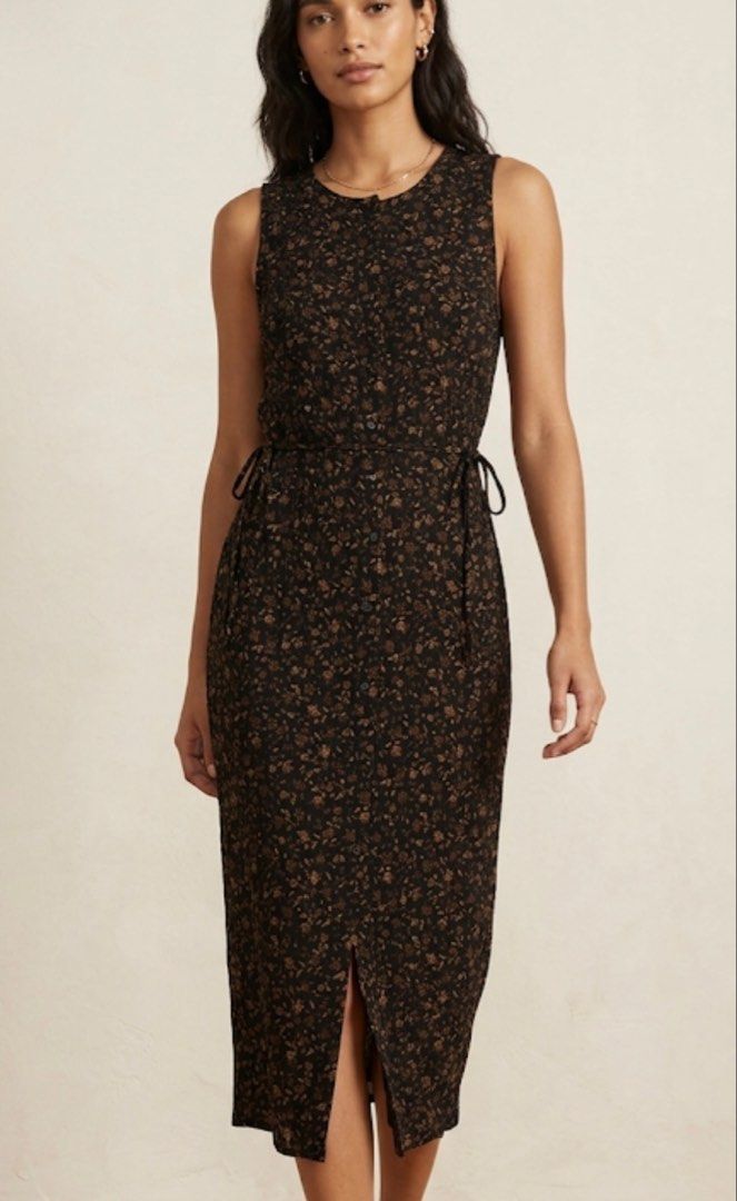 Erika Studio Floral Dress (Category: Dresses) located in Angeles City. Submitted by deyninazd (Listing ID 1438456059, Image 1). Description: - Brand: Erika Studio - Size: L-XL - Style: Vintage midi dress - Features: Black floral print, button-down front, tie-waist - Design: Sleeveless - Length: Midi - Occasion: Casual or semi-formal.