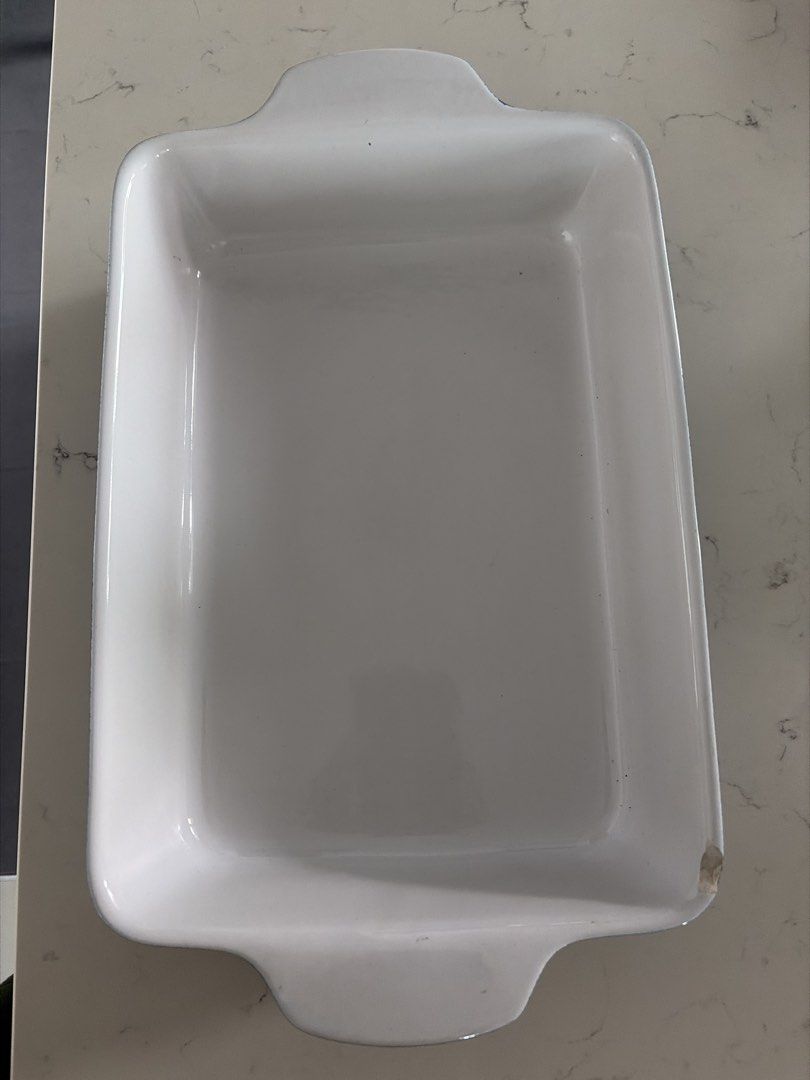 Fontignac Rectangular Baking Dish (Category: Bakeware) located in Singapore. Submitted by radaffair (Listing ID 1439825094, Image 1). Description: - Fontignac rectangular baking dish - White interior, blue exterior - Oven-safe - Durable - Ideal for casseroles and roasting -30cm by 20cm.