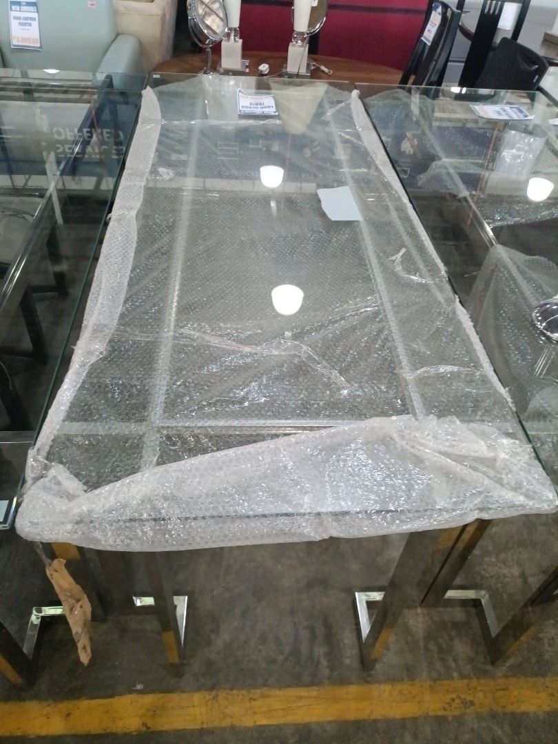 GLASS Long Glass Dining Table (Category: Tables & Sets) located in Paranaque City. Submitted by materesadimasaca (Listing ID 1439838988, Image 2). Description: - Brand new rectangular dining table. - Features an elegant glass top. - Durable stainless steel frame. - Modern design. - Spacious enough for multiple chairs. - Ideal for dining and entertaining..
