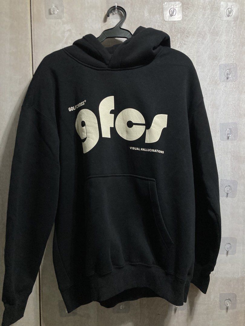 GOLF x 9fcs Visual Hallucinations Black Hoodie (Category: Coats, Jackets and Outerwear) located in Iloilo. Submitted by __kyleeee__ (Listing ID 1439918927, Image 1). Description: - Black hoodie - '9fcs VISUAL HALLUCINATIONS' graphic print on front - Drawstring hood - Front kangaroo pocket - Comfortable and stylish for everyday wear.