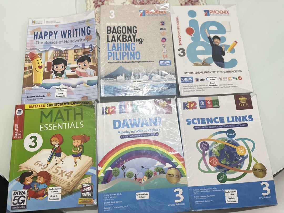 Grade 3 LSM Textbooks (Category: Textbooks) located in Mandaluyong City. Submitted by TheWeekendProject (Listing ID 1439961041, Image 1). Description: - Set of Grade 3 textbooks LSM Lourdes School of Mandaluyong - Take All! - Subjects include: Math Essentials, Science Links, Dawa: Makulay na Wika at Pagbasa, Happy Writing, and Integrated English - Essential learning materials for Grade 3 students in the Philippines.
