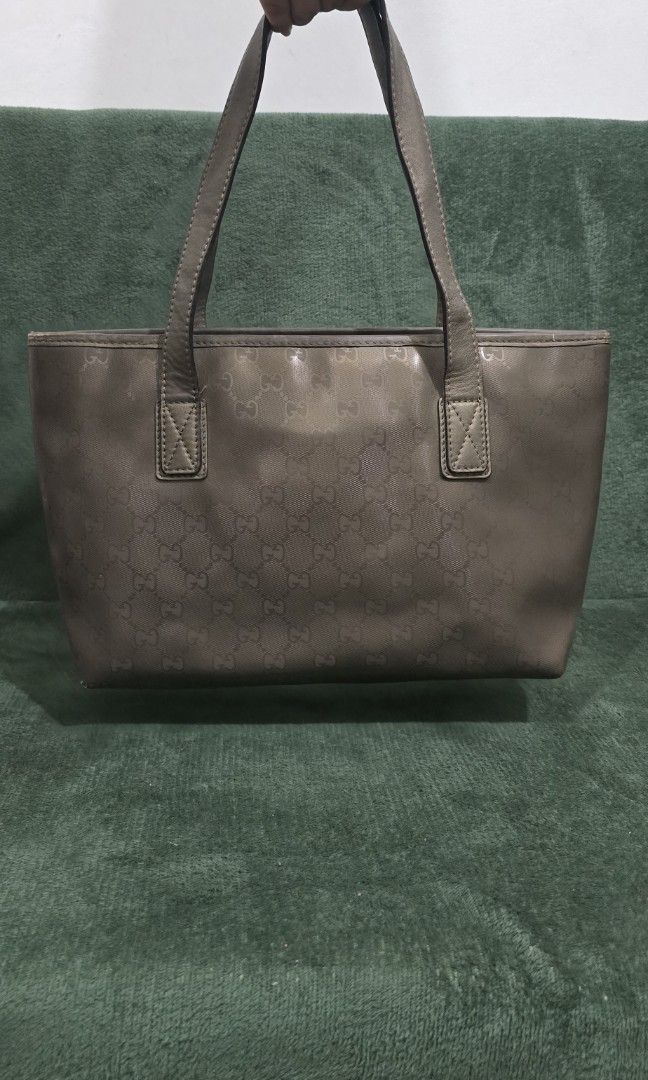 Gucci Bronze Imprime Monogram Mini Tote (Category: Luxury Bags & Wallets) located in Bacoor. Submitted by deux_trading_corporation (Listing ID 1439954641, Image 2). Description: One of my personal favorite. Rare gucci color. condition: Rank A - normal signs of wear pm your tawad.