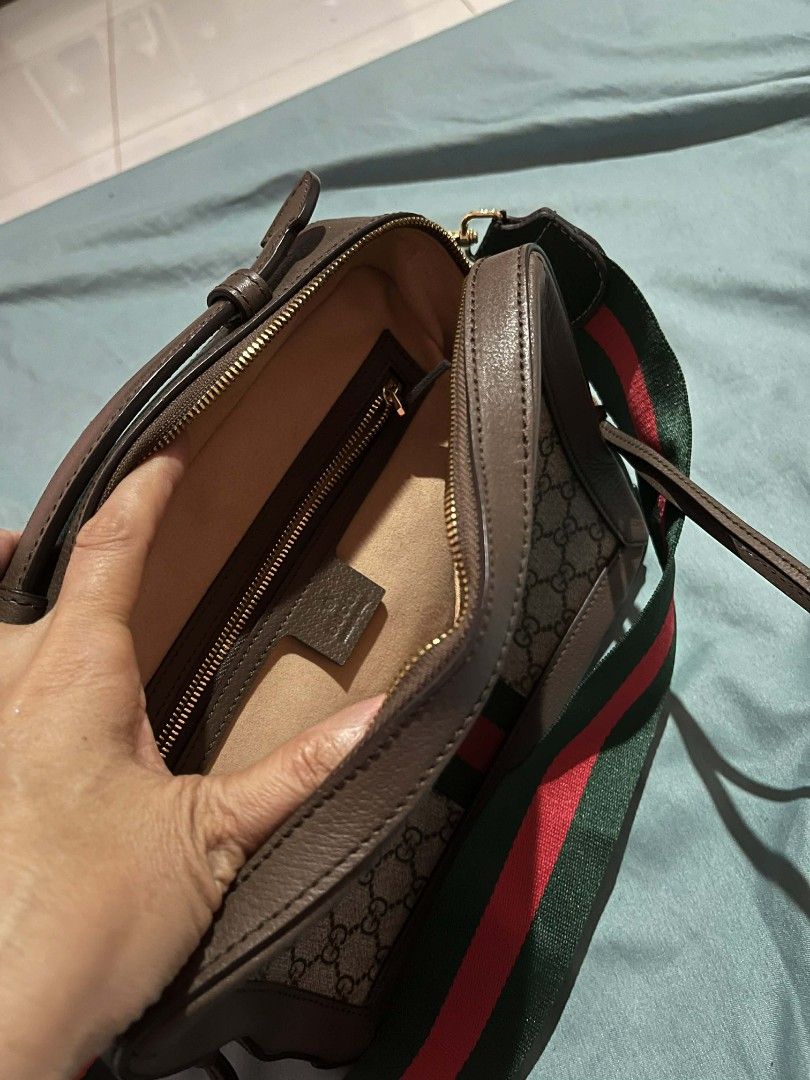 Gucci GG Supreme Shoulder Bag (Category: Luxury Bags & Wallets) located in Urdaneta. Submitted by ilovemomohiraii (Listing ID 1439828912, Image 3). Description: - Authentic Gucci shoulder bag - Iconic GG Supreme canvas with red and green stripe - Brown leather trim - Detachable shoulder strap - Interior zippered pocket - Gucci logo and "Made in Italy" tag.