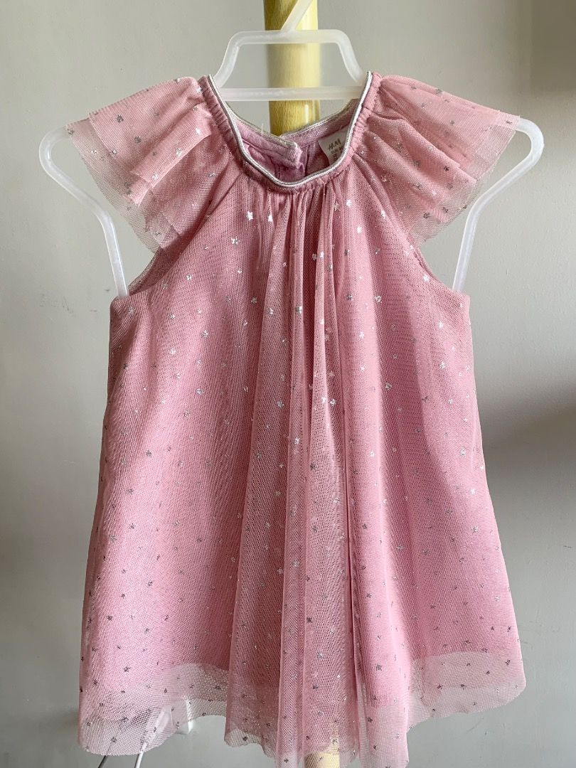 H&M Baby Girl Pink Tulle Dress with Silver Sparkles (Category: Babies & Kids Fashion) located in Quezon City. Submitted by warmrabbit_414908 (Listing ID 1439988667, Image 1). Description: - Adorable pink H&M baby dress - Delicate tulle overlay with scattered silver sparkles - Shimmering silver ribbon trim on neckline and sleeves - Perfect for special occasions or everyday wear.