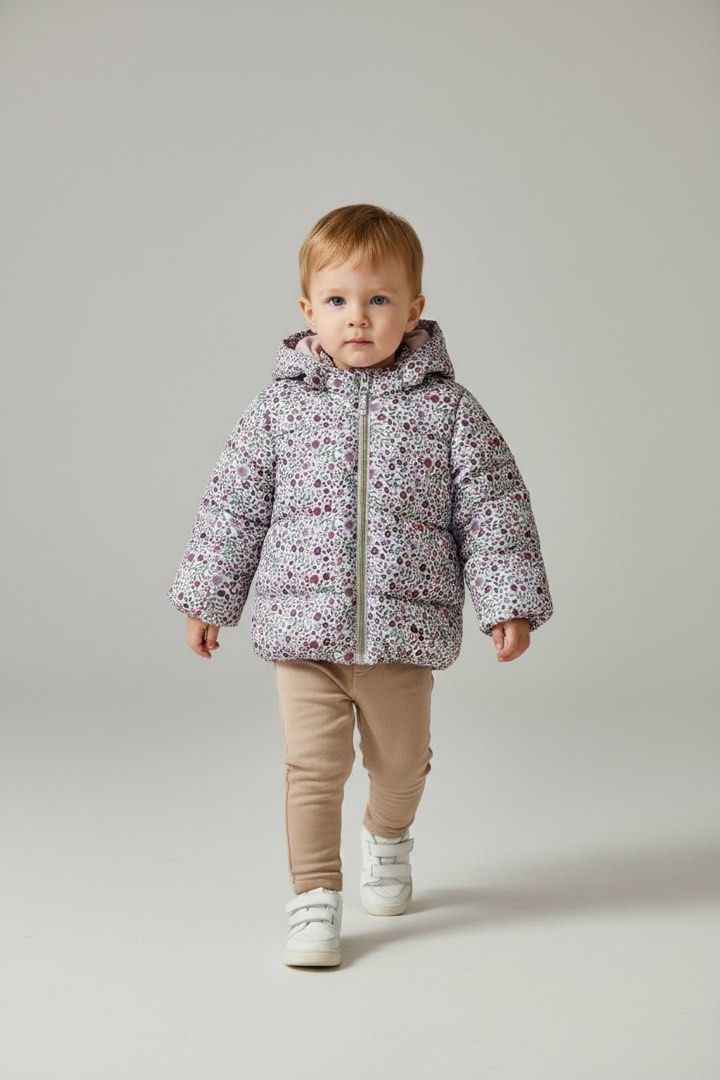 H&M Floral Padded Jacket with Hood (Category: Babies & Kids Fashion) located in Taguig. Submitted by vhiascloset (Listing ID 1439851642, Image 3). Description: - Adorable floral padded jacket - Cozy hood - Full-length zipper - Designed for warmth and comfort - Perfect for cooler weather - Stylish outerwear for your little one.