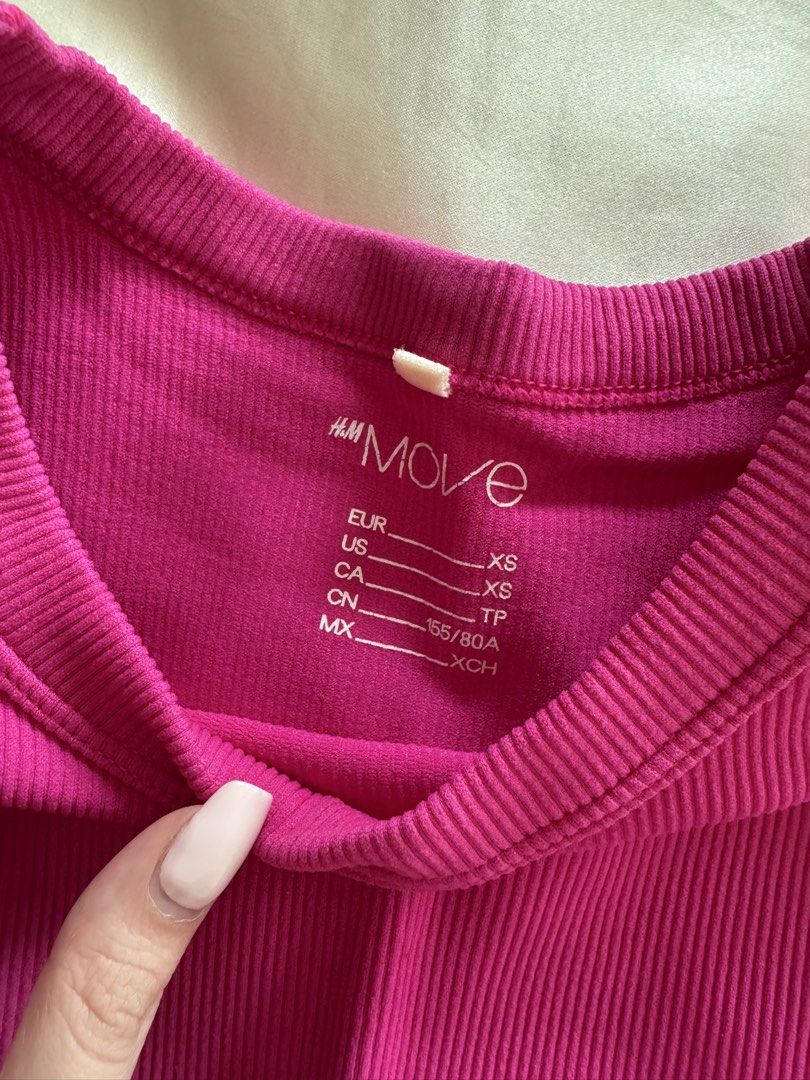 H&M Move Fuschia Tank Top (Category: Sleeveless) located in Manila. Submitted by camille_cai (Listing ID 1439894203, Image 2). Description: H&M Move (Active wear line) Ribbed Tank Top Fuchsia Pink Color Fits XS-M Stretchy fabric Used Once only.