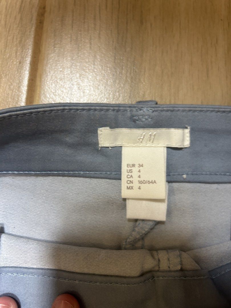 H&M Work Pants - size 4 (Category: Other Bottoms) located in Makati City. Submitted by ckvdeclutter (Listing ID 1439826600, Image 3). Description: - H&M straight-leg pants - Colors: Light blue and navy - Buy both for ₱400, Buy 1 pair for ₱250 - Size: EUR 34, US 4, CA 4, CN 160/64A - Classic straight-leg design - Ideal for everyday use.