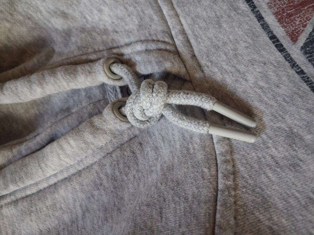 Hurley Hoodie - Gray - (Category: Hoodies) located in Cavite. Submitted by eks1999 (Listing ID 1439820898, Image 3). Description: - Gray Hurley hoodie - Features a front pocket and drawstring hood - Hurley trademark graphic on the front - Small Hurley logo on the sleeve - Made in Bangladesh dimes- L26"5 W-20"5.