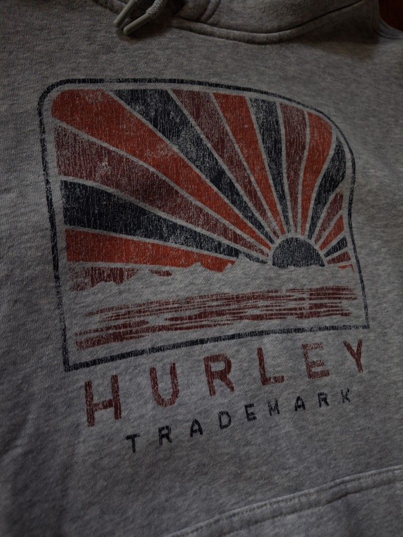 Hurley Hoodie - Gray - (Category: Hoodies) located in Cavite. Submitted by eks1999 (Listing ID 1439820898, Image 2). Description: - Gray Hurley hoodie - Features a front pocket and drawstring hood - Hurley trademark graphic on the front - Small Hurley logo on the sleeve - Made in Bangladesh dimes- L26"5 W-20"5.
