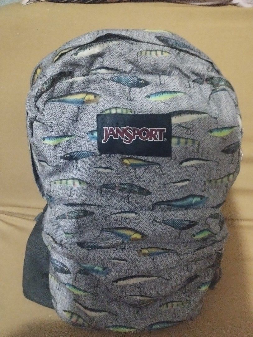 Jansport Backpack - Fishing Lure Print (Category: Backpacks) located in Taguig. Submitted by joyrsb2786400 (Listing ID 1439959389, Image 1). Description: - Unique all-over fishing lure print - Adjustable padded shoulder straps for comfort - Spacious main compartment - Durable construction for everyday use, school, or travel - Ideal for Jansport collectors and enthusiasts.