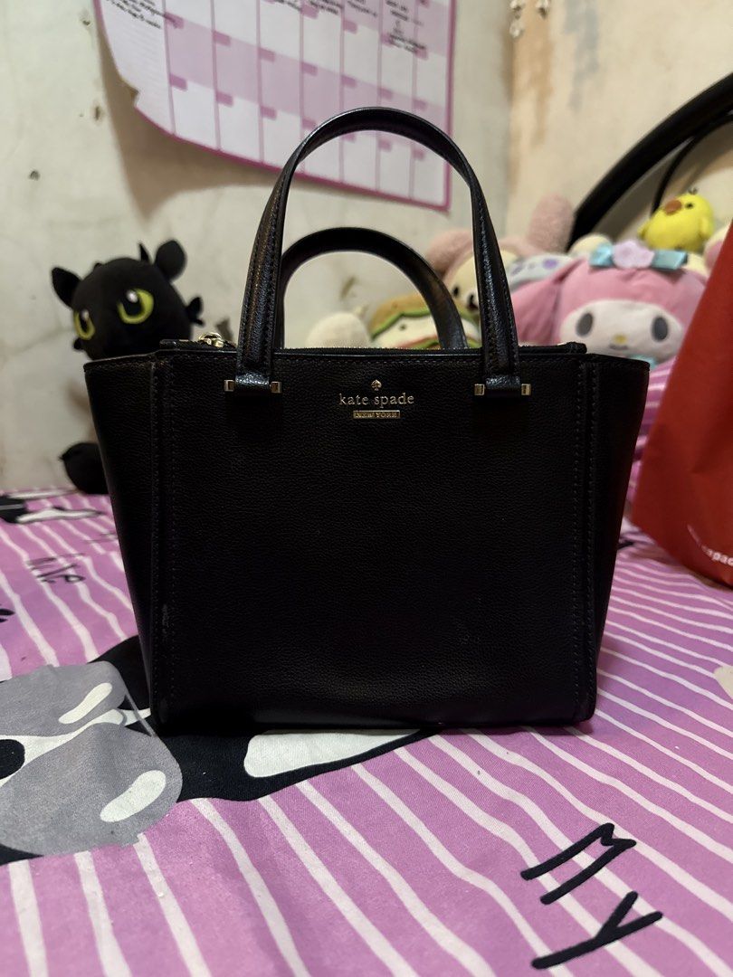 Kate Spade New York Mini Satchel Bag (Category: Luxury Bags & Wallets) located in Bulacan. Submitted by xiaolongdoll (Listing ID 1439916021, Image 1). Description: 🪽Authentic 🪽with strap 🪽minor issue (see pic) but no damage 🪽YKK zip rfs: too many bags .