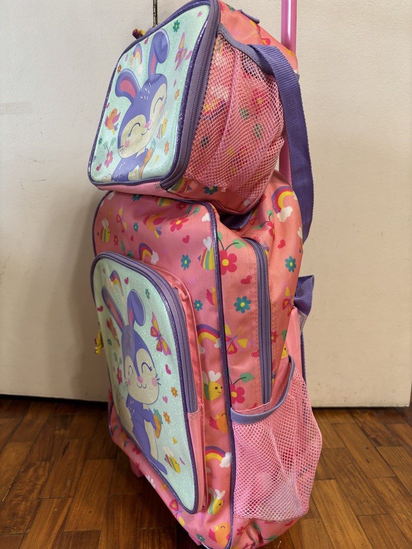 Kids 2-in-1 Trolley & Backpack and Lunchbox Set (Category: Babies & Kids Fashion) located in Pasig City. Submitted by amandrey (Listing ID 1439860299, Image 3). Description: - Adorable bunny design - Trolley and backpack in one, with retractable handle and wheels - Multiple compartments and side pockets - Matching lunchbox with handle - Ideal for school and travel.