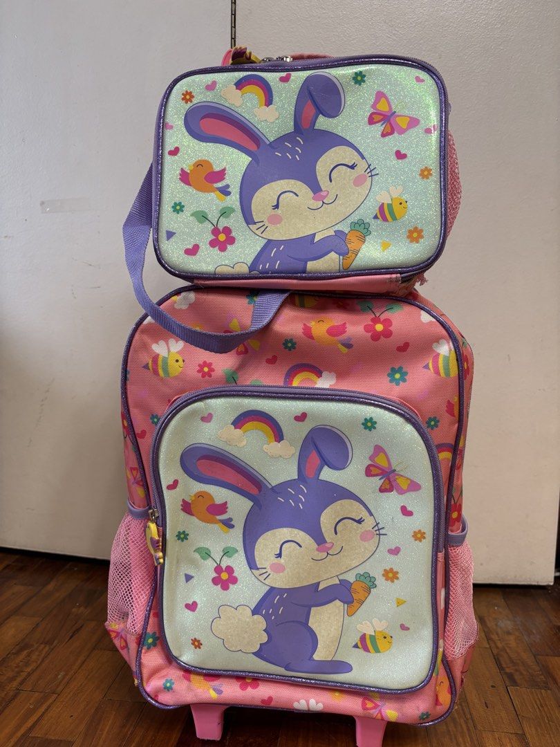 Kids 2-in-1 Trolley & Backpack and Lunchbox Set (Category: Babies & Kids Fashion) located in Pasig City. Submitted by amandrey (Listing ID 1439860299, Image 2). Description: - Adorable bunny design - Trolley and backpack in one, with retractable handle and wheels - Multiple compartments and side pockets - Matching lunchbox with handle - Ideal for school and travel.