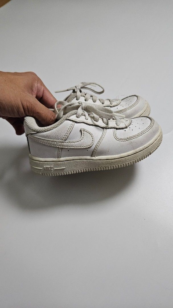 Kids Nike Air Force 1 Sneakers (Category: Babies & Kids Fashion) located in Alfonso. Submitted by jbcamet (Listing ID 1439948743, Image 1). Description: - Classic white Nike Air Force 1 sneakers - Durable leather upper - Signature Nike Air cushioning for comfort - Versatile for everyday wear - Secure lace-up closure - sizs 9 2 to 4 years old.