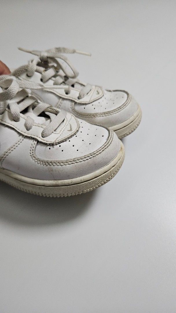 Kids Nike Air Force 1 Sneakers (Category: Babies & Kids Fashion) located in Alfonso. Submitted by jbcamet (Listing ID 1439948743, Image 2). Description: - Classic white Nike Air Force 1 sneakers - Durable leather upper - Signature Nike Air cushioning for comfort - Versatile for everyday wear - Secure lace-up closure - sizs 9 2 to 4 years old.