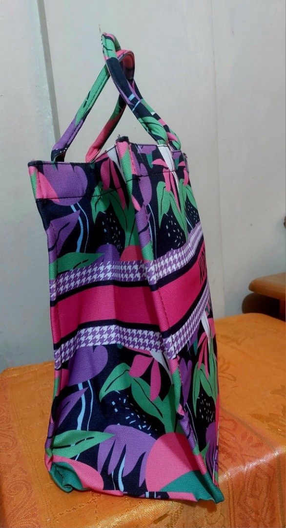 KUROMI Sanrio book tote Large size (Category: Tote Bags) located in Las Pinas. Submitted by jmproperties (Listing ID 1439927353, Image 3). Description: - Cute Kuromi graphic on a vibrant tropical leaf print tote bag. - Fun abstract pattern on the interior lining. - Spacious design for all your essentials. - Sturdy handles for comfortable carrying. - Perfect for everyday use and stylishly carrying your belongings. size : 47 x 35 x 17cm.