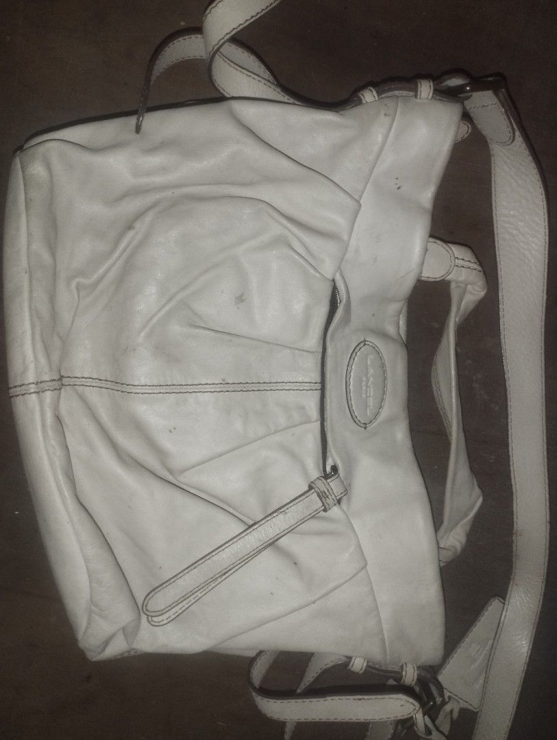 Lancel Paris White Leather Shoulder Bag (Category: Luxury Bags & Wallets) located in Manila. Submitted by clevercat-a177 (Listing ID 1439979437, Image 1). Description: 🛍️ AUTHENTIC LANCER PARIS LEATHER BAG Brand: LANCER PARIS ✅ LEGIT Color: White/Cream Condition: 6/10 (needs light cleaning) 💰 Price: ₱1130 FIRM (OG Price: ₱8,500+) ✅ 100% Authentic European Brand ✅ Genuine leather construction ✅ Crossbody & handheld style ✅ Classic timeless desig