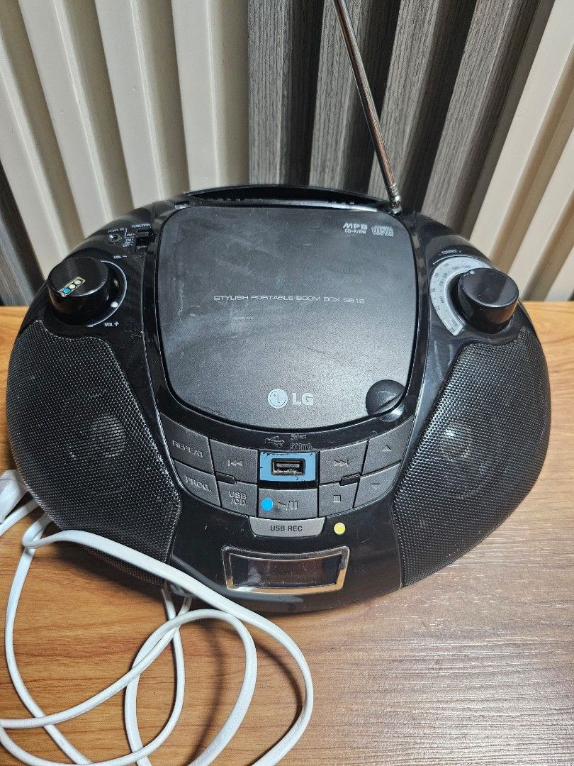 LG Radio AM/FM CD Player Not working (Category: Portable Music Players) located in Manila. Submitted by mamaloverakkie (Listing ID 1439886784, Image 3). Description: ISSUE: CD PLAYER NOT WORKING ANYMORE! MAY CRACK po left side minor lang naman po hnd nman nkakaapekto sa sounds. CD PLAYER AS IS HND NA NASUBUKAN KASI WALANG CD. - LG portable CD player - Radio functionality - USB port - Built-in antenna - Includes power cord - Buttons and display sc