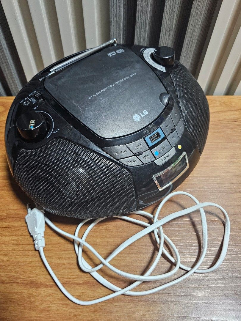 LG Radio AM/FM CD Player Not working (Category: Portable Music Players) located in Manila. Submitted by mamaloverakkie (Listing ID 1439886784, Image 1). Description: ISSUE: CD PLAYER NOT WORKING ANYMORE! MAY CRACK po left side minor lang naman po hnd nman nkakaapekto sa sounds. CD PLAYER AS IS HND NA NASUBUKAN KASI WALANG CD. - LG portable CD player - Radio functionality - USB port - Built-in antenna - Includes power cord - Buttons and display sc