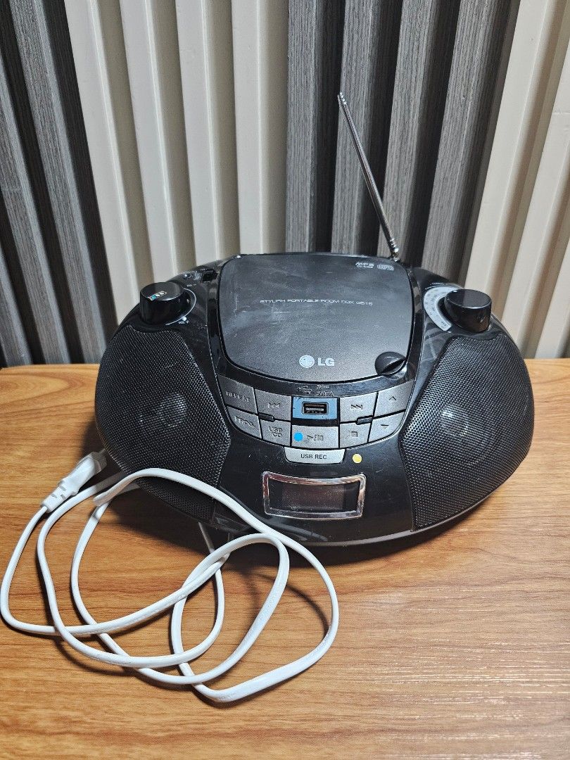 LG Radio AM/FM CD Player Not working (Category: Portable Music Players) located in Manila. Submitted by mamaloverakkie (Listing ID 1439886784, Image 2). Description: ISSUE: CD PLAYER NOT WORKING ANYMORE! MAY CRACK po left side minor lang naman po hnd nman nkakaapekto sa sounds. CD PLAYER AS IS HND NA NASUBUKAN KASI WALANG CD. - LG portable CD player - Radio functionality - USB port - Built-in antenna - Includes power cord - Buttons and display sc