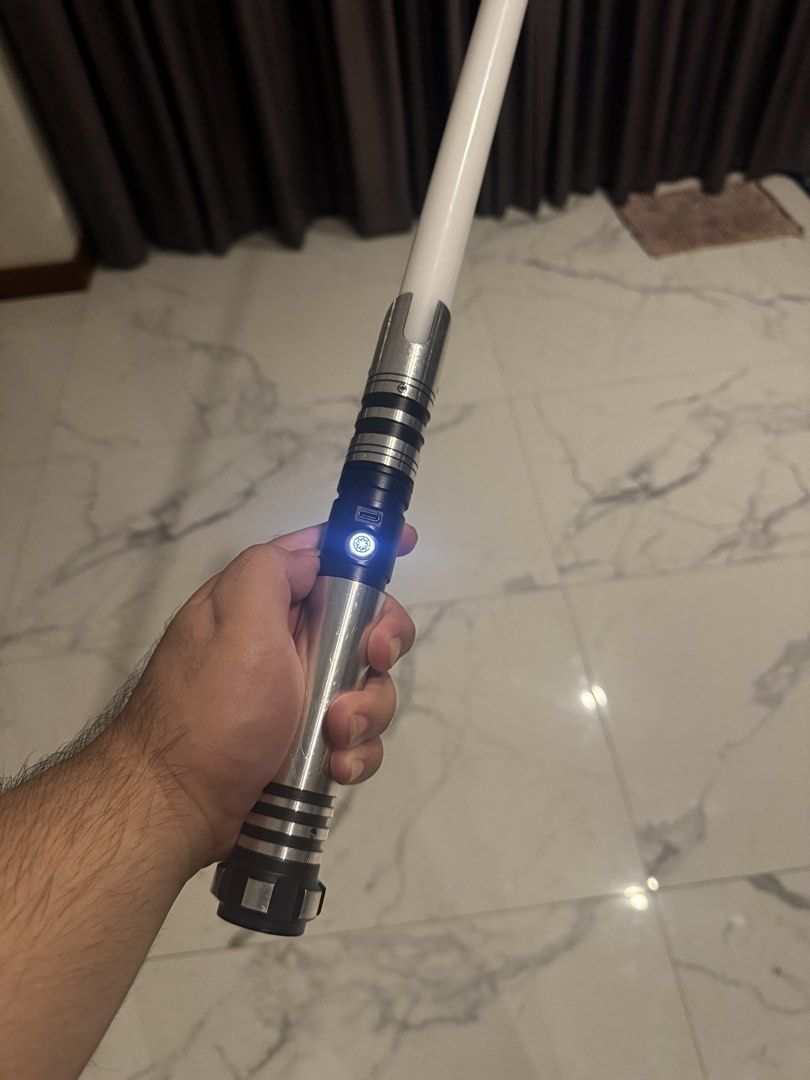 Lightsaber - Silver Hilt (Category: Action & Battle Toys) located in Muntinlupa City. Submitted by alftonveruz (Listing ID 1439964973, Image 2). Description: - Infinite Color Switching - 32-Inch blade - Multiple Light Options: stable, pulse, unstable, etc... - Bluetooth phone control (IOS & Android) (App Name: Xenoconfigurator) - ***IMPORTANT***: ONLY use 5V2A adapter for charging otherwise it will break. Location: Alabang Hills Muntinlupa MOP: G