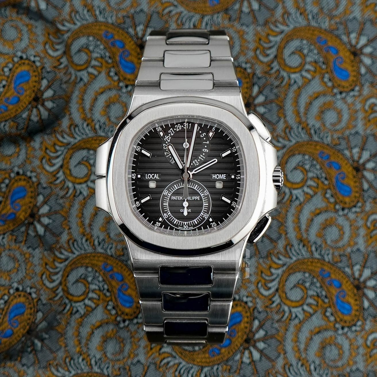 [SOLD - DM to SOURCE] Patek Philippe PP Nautilus Travel Time Chronograph 5990/1A-001 (Category: Watches) located in Singapore. Submitted by calibre65 (Listing ID 1439839698, Image 1). Description: This piece has been SOLD. DM us and we can source a similar piece for you! Patek Philippe PP Nautilus Travel Time Chronograph Reference Number: 5990/1A-001 Condition: Like New Comes with: Full Set (Box & Papers) Dated: Q1 2018 Size: 40.5mm Case material