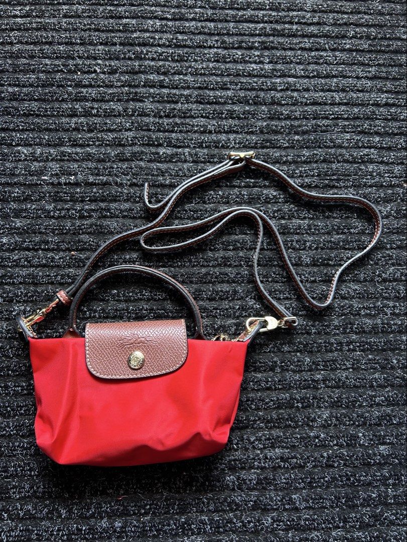 Longchamp Le Pliage Extra Pouch (Category: Luxury Bags & Wallets) located in Pasig City. Submitted by califinestcollectibles (Listing ID 1439850136, Image 1). Description: referred to as the Le Pliage Cuir Extra Pouch or the micro/pouch version with a handle and removable strap Length : 20cm Width : 7 cm Height: 11cm Original/Authentic From USA Actual and Detailed Pictures are Posted Pick Up at One Oasis condominium ortigas extension pasig city O