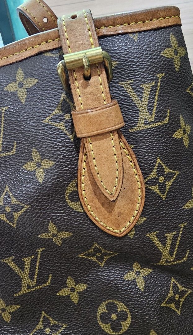Louis Vuitton Monogram Canvas Petite Bucket Bag (Category: Luxury Bags & Wallets) located in Manila. Submitted by everythingnice8888 (Listing ID 1439879379, Image 3). Description: Louis Vuitton Monogram Canvas Petit Bucket Bag (often referred to as the Bucket PM). Key Characteristics Material: Crafted from the brand's classic water-resistant coated canvas featuring the iconic interlocking LV initials and floral motifs. Trim: Features natural vach