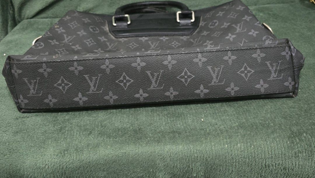 Louis Vuitton Odyssey Briefcase (Category: Luxury Bags & Wallets) located in Bacoor. Submitted by deux_trading_corporation (Listing ID 1439957207, Image 3). Description: Louis Vuitton Odyssey Briefcase in Monogram Eclipse coated canvas. Still 100k plus on 2ndhand market. Condition: Rank A - normal signs of wear pm your tawad.