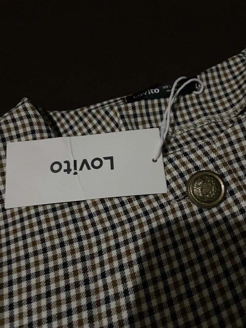 Lovito Plaid Blazer with Gold Buttons (Category: Coats, Jackets and Outerwear) located in Plaridel. Submitted by julien_stuff (Listing ID 1439932884, Image 2). Description: - Stylish plaid blazer from Lovito CAN FIT FROM SMALL TO MEDIUM - Classic collarless design - Four ornate gold-tone front buttons - Two functional flap pockets - Gold-tone buttons on cuffs - Versatile for smart casual or formal occasions.