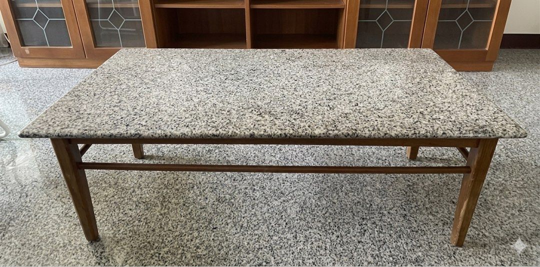 Marble Coffee Table (Category: Tables & Sets) located in Singapore. Submitted by dropsofsummer (Listing ID 1439842657, Image 1). Description: Marble table with wooden legs. Dimensions: 120 cm length x 60 cm width x 42 cm height .