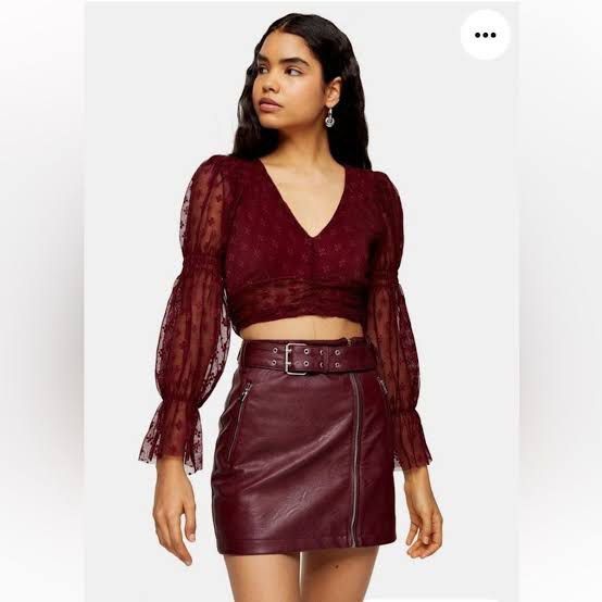 Maroon Sheer Puff Sleeve Crop Top with Tie Back (Category: Blouses) located in Bambang. Submitted by weeeyyaaa (Listing ID 1439931459, Image 1). Description: - Chic maroon crop top - Sheer, textured fabric with subtle all-over pattern - Flattering V-neckline - Voluminous puff sleeves with flared cuffs - Adjustable tie-back closure - Perfect for evening wear or special occasions -can fit s-semi m.