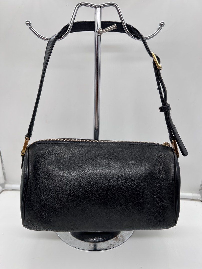 MCM Papillon barrel black pebbled leather shoulder bag (Category: Shoulder Bags) located in Cavite. Submitted by aellavier (Listing ID 1439812866, Image 3). Description: orig preloved, faded gold hardwares. no major issue.