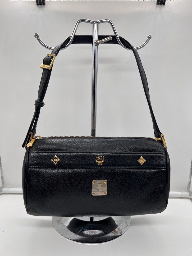 MCM Papillon barrel black pebbled leather shoulder bag (Category: Shoulder Bags) located in Cavite. Submitted by aellavier (Listing ID 1439812866, Image 1). Description: orig preloved, faded gold hardwares. no major issue.